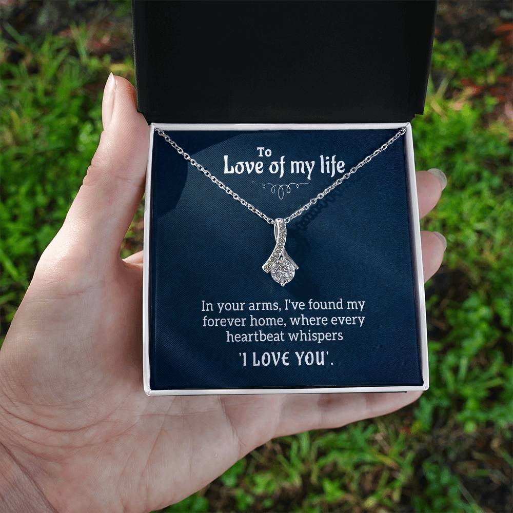 Alluring Beauty CZ necklace shown as a romantic gift for the love of your life.